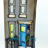 a shaped house card